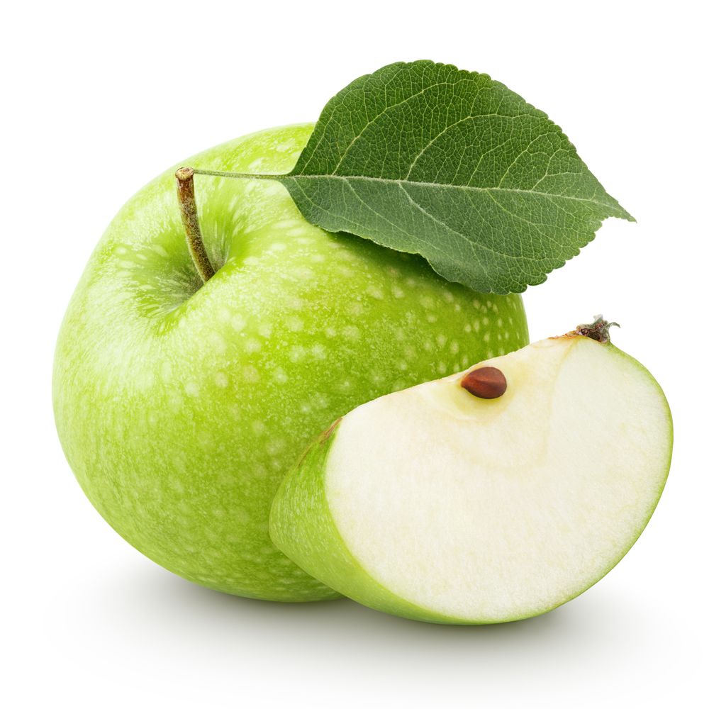 Zelena jabuka u krupnom planu i isečena kriška.
