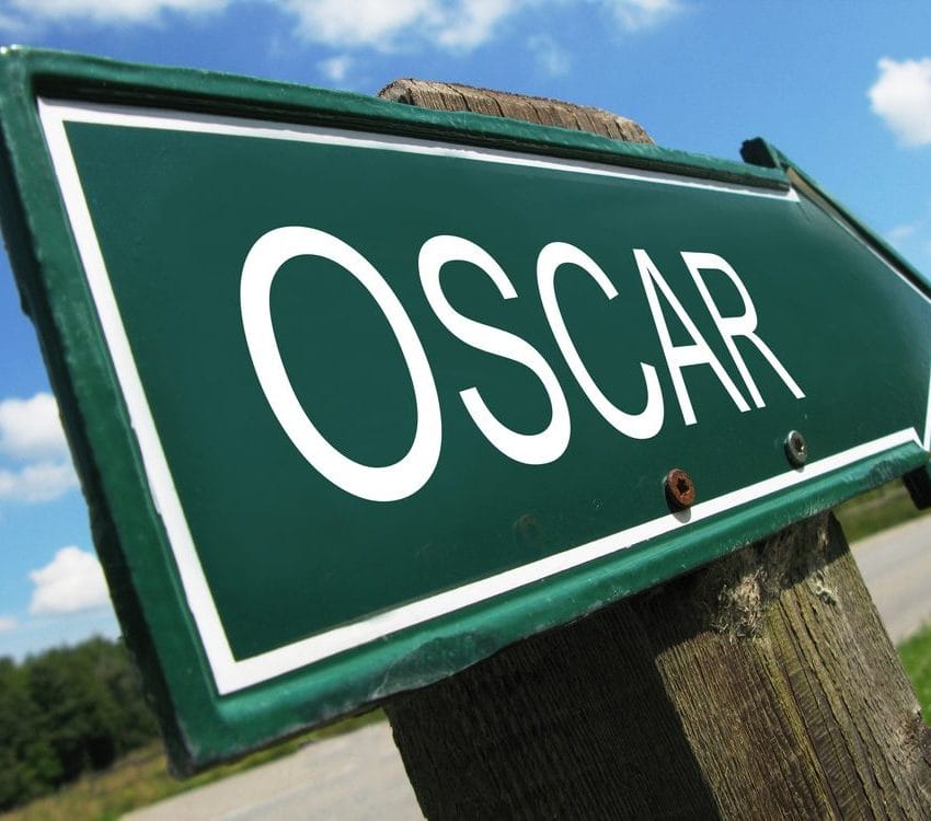 Zeleni znak na putu na kome belim slovima piše OSCAR.